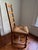 A lovely set of six French country style dining chairs in solid oak, each with tall, pitched ladder backs featuring four...