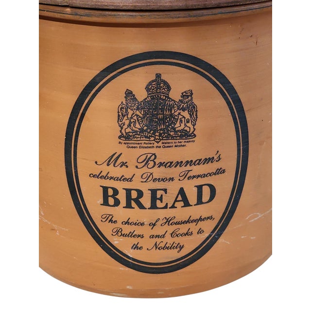 Fine example of mid century Brannam's Royal Barum Ware terracotta bread bin with wooden lid, in excellent condition. Made...