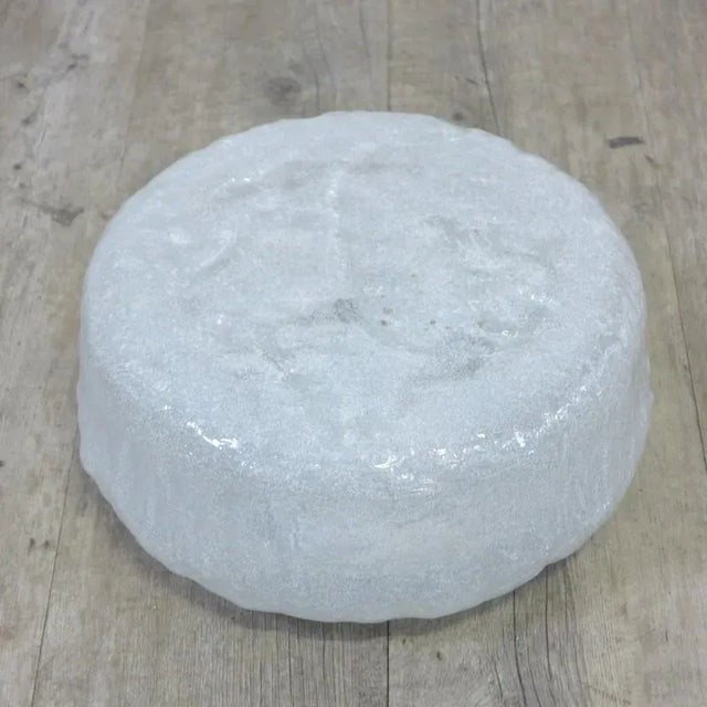 This mid-century wall or ceiling lamp was made in Germany by Doria. The lampshade is made from an ice glass structure....