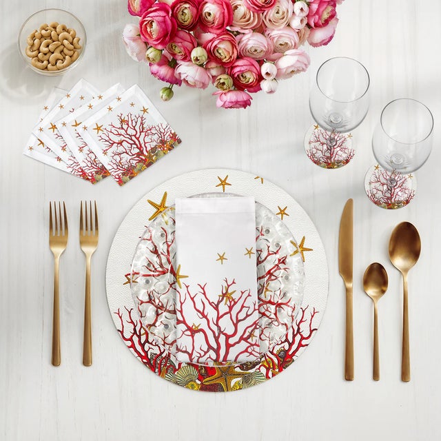 Let the whimsy of the sea wander gracefully into your table with our Coral Reef Vegan Leather Round Pebble Placemat....