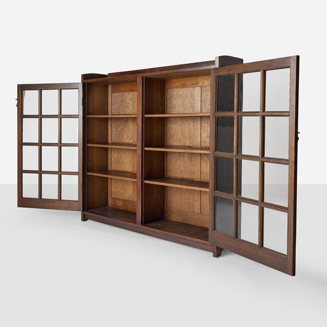 Description Large Two-Door Bookcase by Gustav Stickley United States, c1910s American Arts and Crafts bookcase by Gustav...