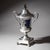 An elegant French silver drageoir or bonbonnière with a removable cobalt blue glass liner and a gilt interior. The lid is...