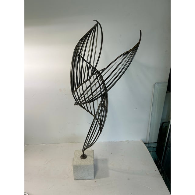Beautiful brutalist abstract sculpture on granite base. Perfect for a man cave or any interior that likes modern sculpture...