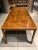 Vintage Chinoiserie parsons style 9’ extendable dining table model “Portfolio II” in solid mahogany, having burl wood...