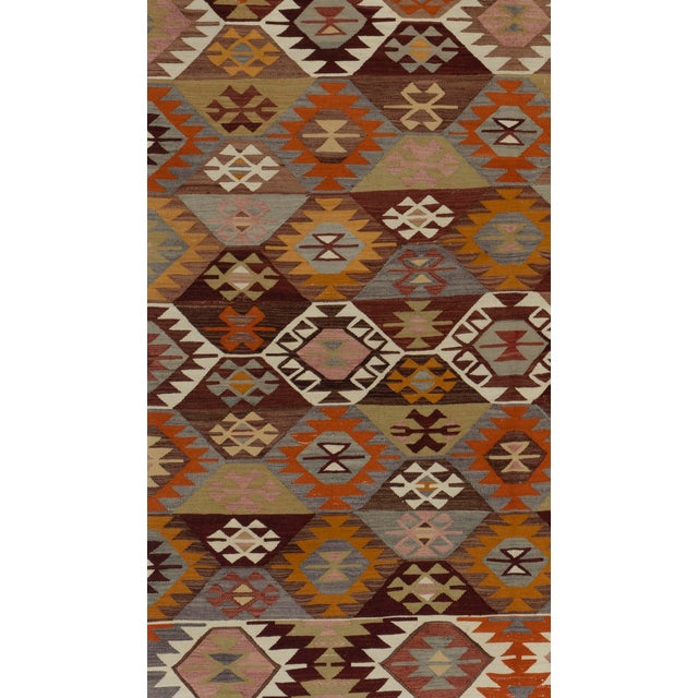 This vintage Turkish flat weave Kilim is hand-woven. The simplicity and boldness of this piece can also give a...