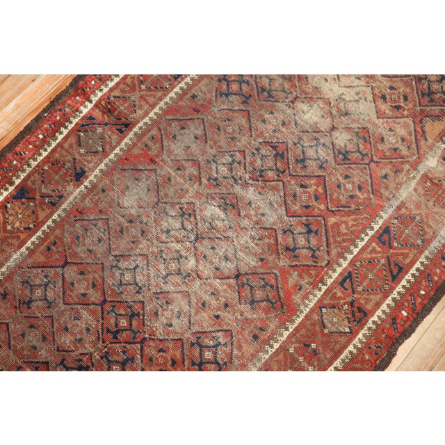 A late 19th century distressed Balouch Rug Details rug no. j3987 size 3' 4" x 6' 3" (102 x 191 cm)
