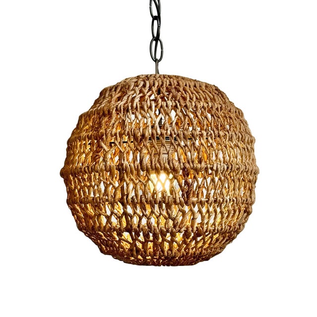 Hand braided banana leaf globe pendant light. Natural beautiful varying tones of tans and browns. Each pendant may vary in...