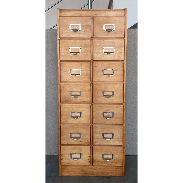 About the Item Large bank of French Art Deco filing drawers, circa 1930s. - solid oak drawers and frame - oak ply panels...