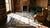1900s Beige Floral Medallion Hand Knotted Antique Chinese Peking Rug 6' 0" X 9' 0" Wool Carpet For Sale In New York - Image 6 of 7