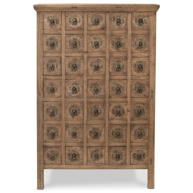 This antique Chinese apothecary chest, made in Shanxi around 1880, displays expert craftsmanship and design. Originally...