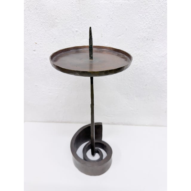 Large candlestick from the 1970s, designed by Manfred Bergmeister for the Bergmeister metalworks. Hallmark on the...