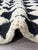 Black & Ivory Checkered Moroccan Rug – Handmade Modern Berber Wool Carpet This striking handmade Moroccan rug features a...