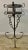 A striking pair of 19th-century wrought iron wall-mounted holders, featuring beautifully hand-forged scrollwork,...