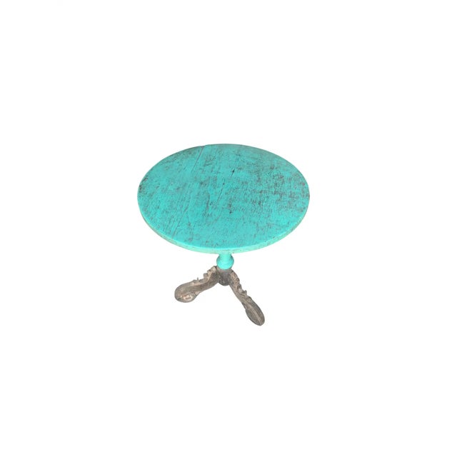 This teak round table was crafted on the island of Madura off the Northeastern coast of Java, Indonesia. It features hand-...