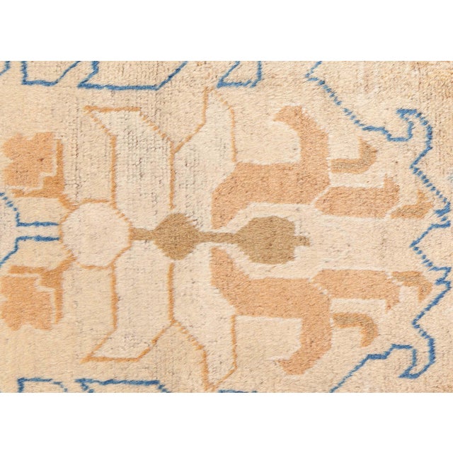 An early 20th century Persian Tabriz antique rug with an unusual lozenge lattice formed of enlarged serrated leaves in...