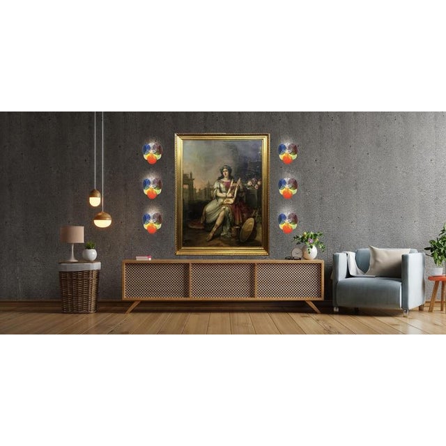 Set of Four vintage Italian Murano appliques in Vistosi style. Wall lights have 10 glass for each. multicolored. The...