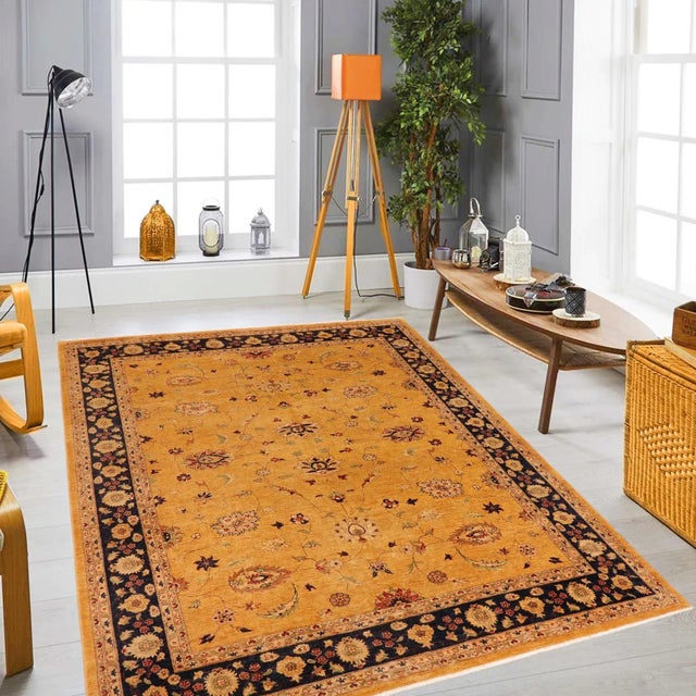 "Enhance the ambiance of your home with this magnificent Persian-influenced Turkish hand-knotted rug made by skilled...