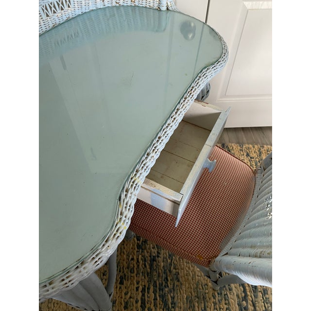 Beautiful wicker writing desk and marching chair amazing condition with glass top!! Solid.Chair is 31" tall 16.5" x 16"...