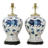 Pair of Vintage Brunschwig & Fils Cadiz Table Lamps - Blue and Cream Ceramic With Boar and Deer Motif For Sale