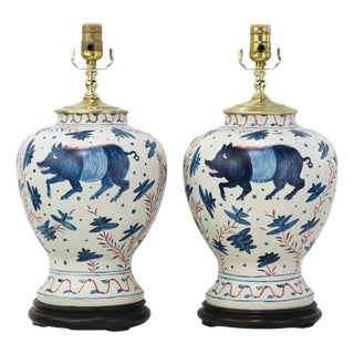 Pair of Vintage Brunschwig & Fils Cadiz Table Lamps - Blue and Cream Ceramic With Boar and Deer Motif For Sale