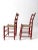 These charming antique American splint weave chairs boast a classic rustic design. The dark red ladder back frames with...
