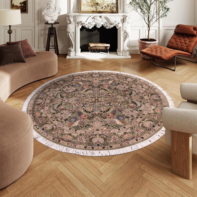 This hand‑knotted Pak Persian round rug showcases the finest expression of traditional Persian artistry. Each piece is...
