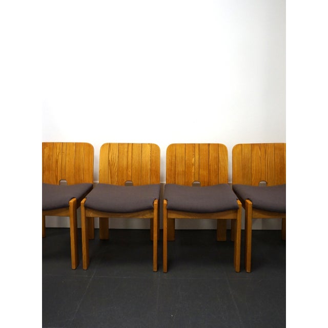 Set of 4 Italian dining chairs. The design is reminiscent of those by Afra and Tobia Scarpa, so as the Italians say,...