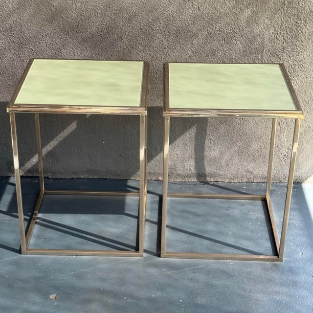 Striking cube-shaped side or end tables in the style of Milo Baughman’s iconic Thinline series, crafted in chrome-plated...