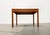 Minimalist teak coffee table from the Danish manufacturer Magnus Olesesen from the 1960s. A very straight design. The legs...