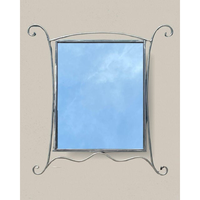 Brushed Nickel Steel Rod Wall Mirror This artful and unique mirror creates smooth lines from strong metal in a tin, pewter...