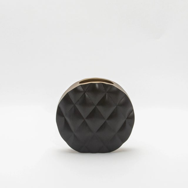 The Coco Vase by Kifu Paris is an exquisite piece that effortlessly merges modern design with luxurious craftsmanship....