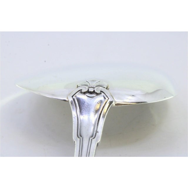 Silver Ice Cream Scoop with Smooth Shell and Crimped Handle Reliefs, in Good conditions.
