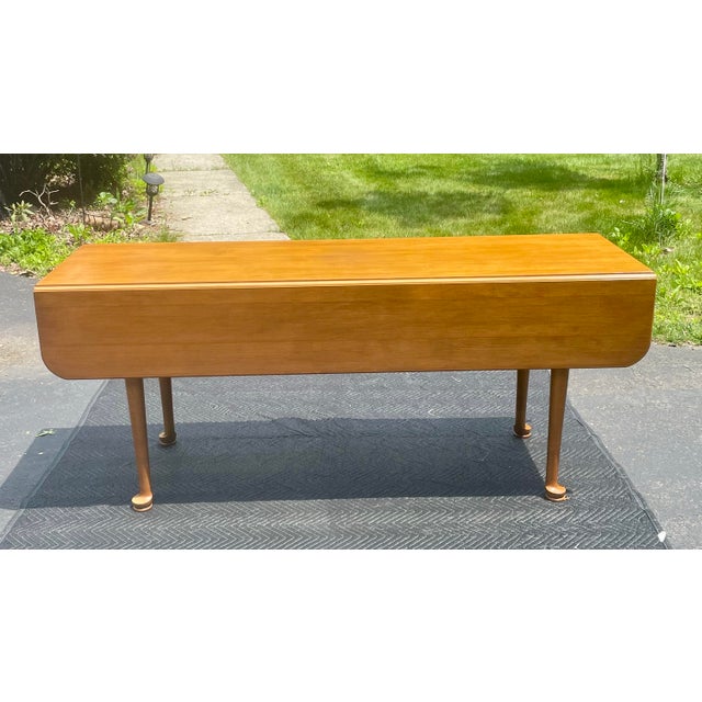 Offered is a vintage Conant Ball harvest table. The table is constructed of solid rock maple with beautiful hand turned...