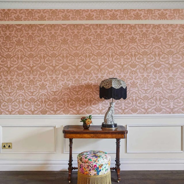 Traditionally printed in England, the ANACONDA wallpaper is a study in contrasts: the 'Dusky-Pink' background is soft and...