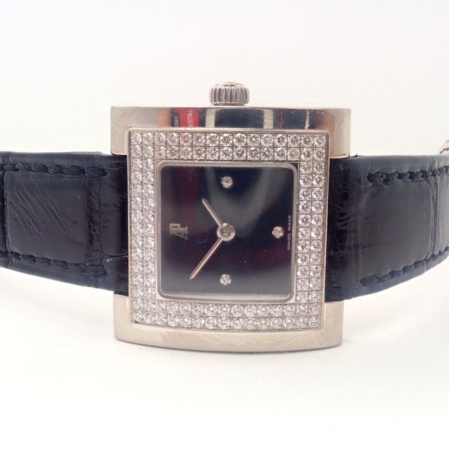 About This Piece: Metal: 18k White Gold Case: 27mm x 27mm Band: Black Audemars Piguet Leather Buckle is 18k White Gold...