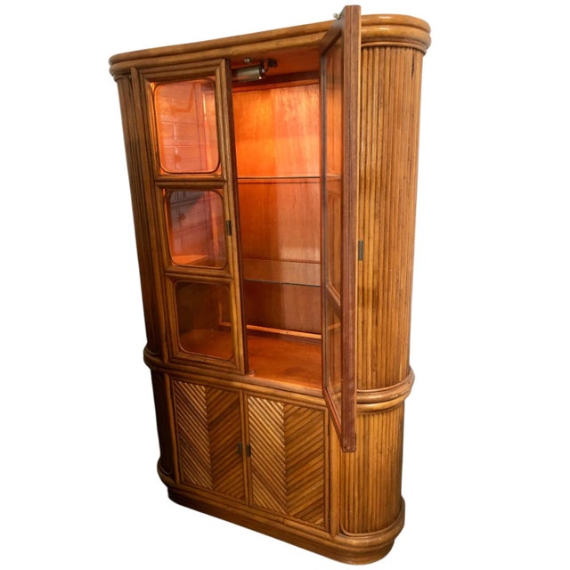 **One-of-a-Kind Split Reed Rattan China/Display Cabinet** Step back in time and discover the epitome of form and function...