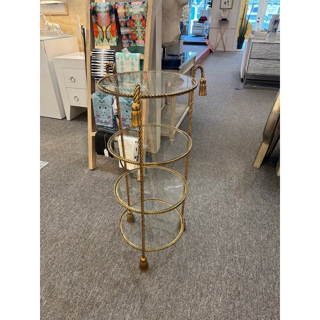Add timeless charm and sculptural elegance to your space with this vintage 4-tier iron Etagere, crafted in the style of...