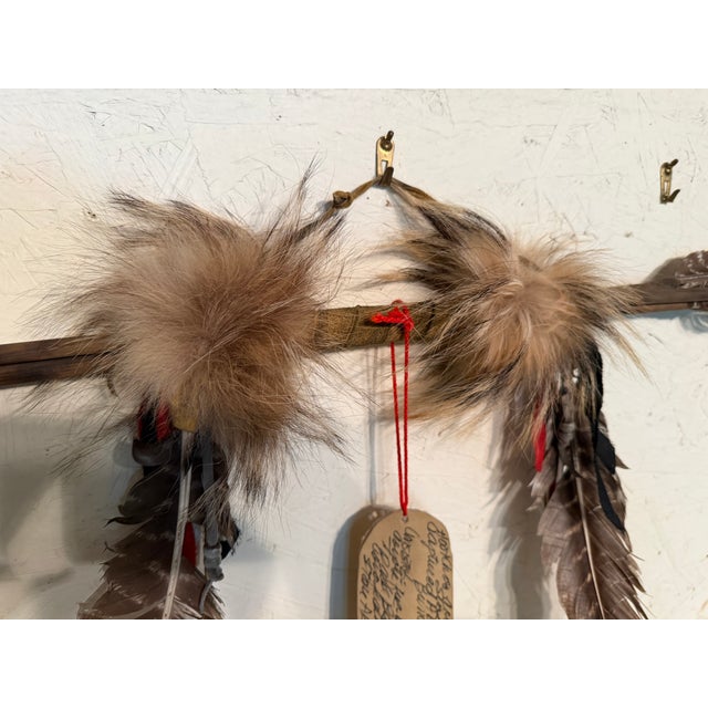 A unique set of authentic South Dakota Indian Aroows in a bundle. The set is three arrows in a bundle wrapped with leather...