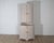 A striking late 18th-century Gustavian period corner cabinet from Sweden, featuring the classic neoclassical elegance of...