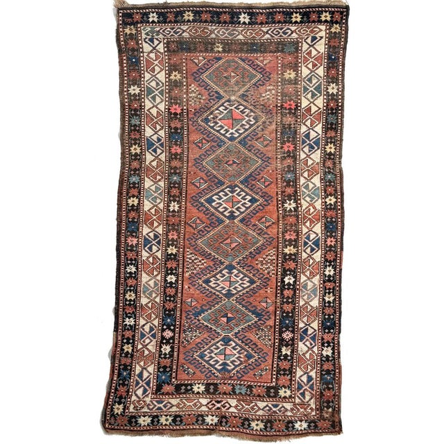 Name: HANDSOME Kazak with Nice Tribal Design in Clay, Terracotta, Amazing Blues and Greens Size: ~ 4 x 7.9 Age: Antique,...