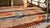 1930s Multi Background Wtih Folk Art Styles Round Antique American Braided Rug For Sale - Image 13 of 15