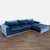 This sectional from Rove Concepts features a rich blue velvet fabric and a sleek light wood base. The modern design offers...