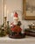Antique German Santa Claus figure crafted of crepe paper, composition, spun cotton, and mixed media, retaining its...