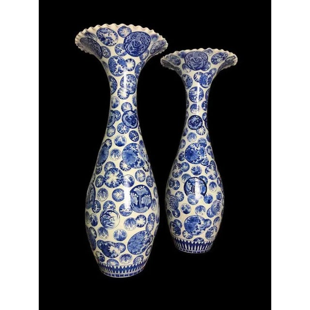 A beautiful pair of large blue and white Porcelain Japanese decorative vases, 19th century. Absolutely stunning in person,...