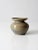 A vintage studio pottery vase, signed by the artist, featuring a beautifully handcrafted form and striking blue and tan...