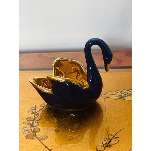 Sean shape porcelain Limoges France salt cellar in cobalt blue and gold.