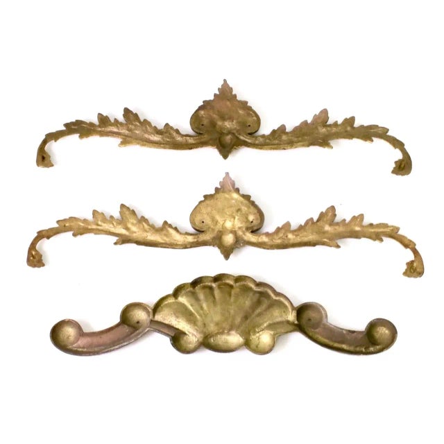 Heavy, high-quality detailed architectural wall / door castings in gold finish. The lot includes a matched pair and a...