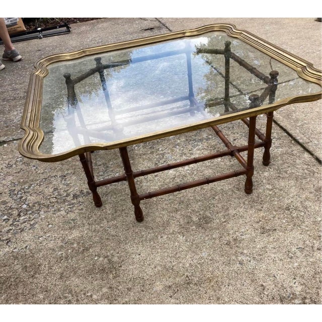 Up for consideration is a beautiful Stately bamboo brass rimmed coffee table. This would look lovely in your home and it...