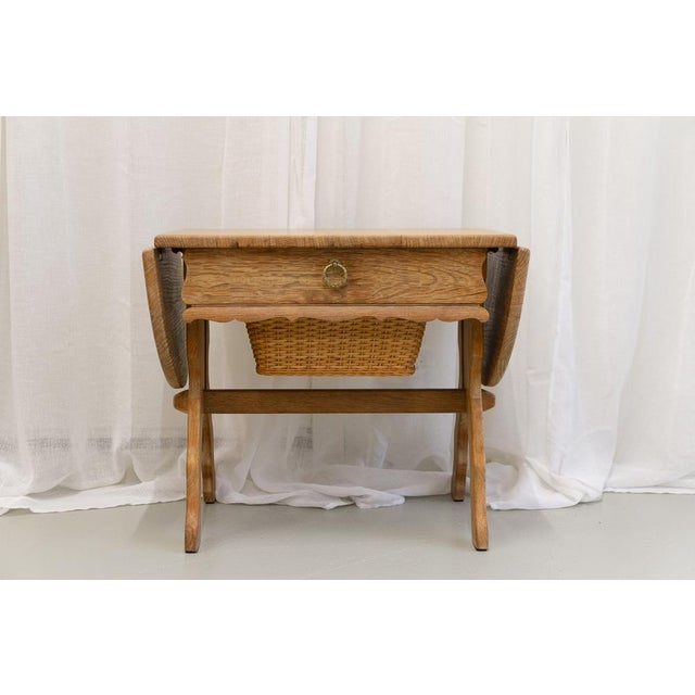 Danish Coffee or Sewing Table in Oak and Rattan, 1970s. Lovely Scandinavian Mid-Century Modern sewing chest in Henning...