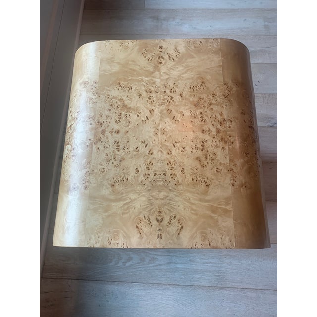 The Worlds Away Putnam side table in burl wood features two tiers and an elegant waterfall edge. The Putnam works equally...